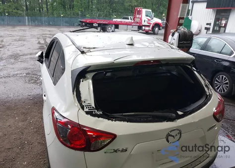 2014 Mazda Cx-5 Grand Touring z USA, uszkodzony, nr VIN JM3KE2DY2E0380138